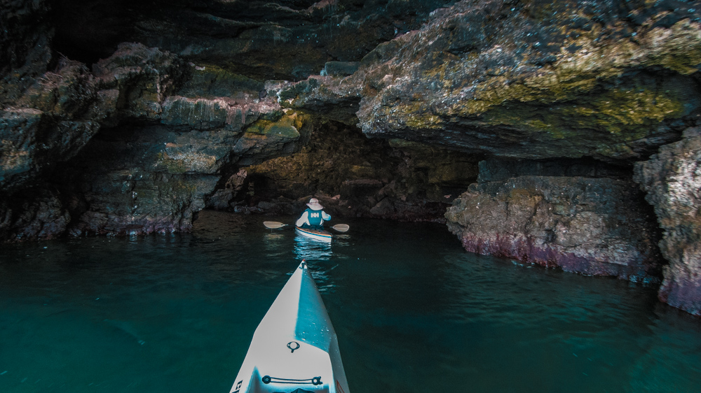 Two kayaks inside a beautiful large cave in the Black Sea