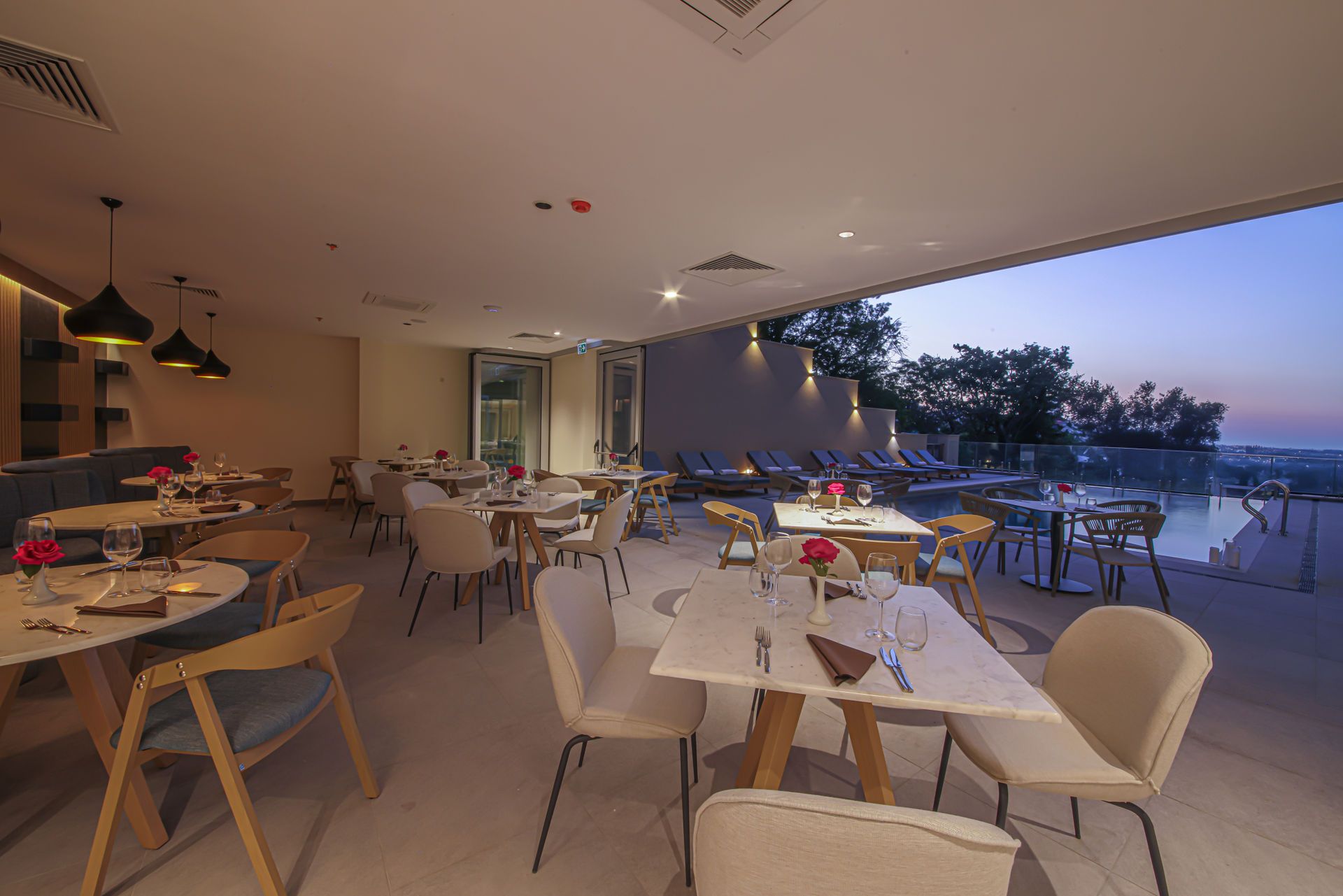 The pool bar in Poseidon Beach Resort - rated best luxury hotel in Varna - leading to an affiliate link in booking.com 