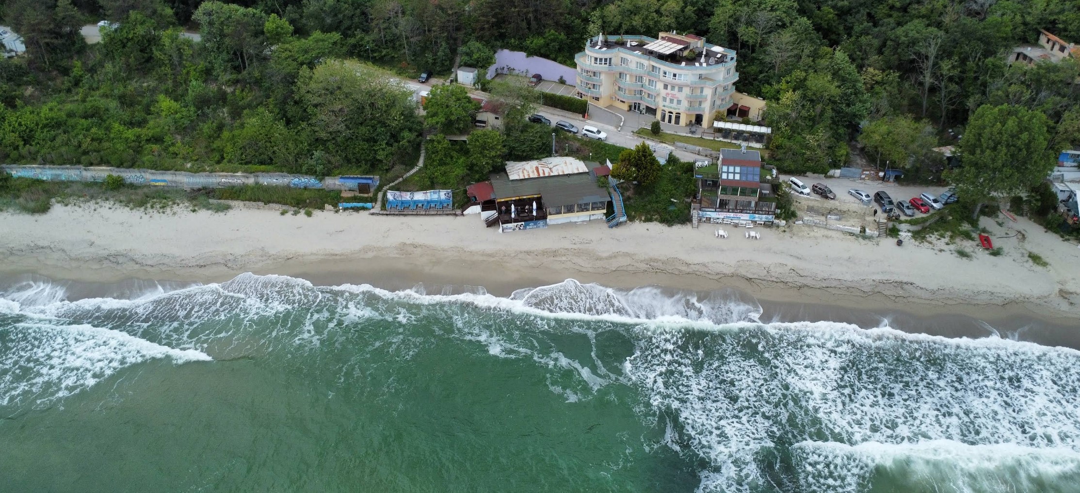 fichoza beach and beach restaurants and guest houses seen from a drone