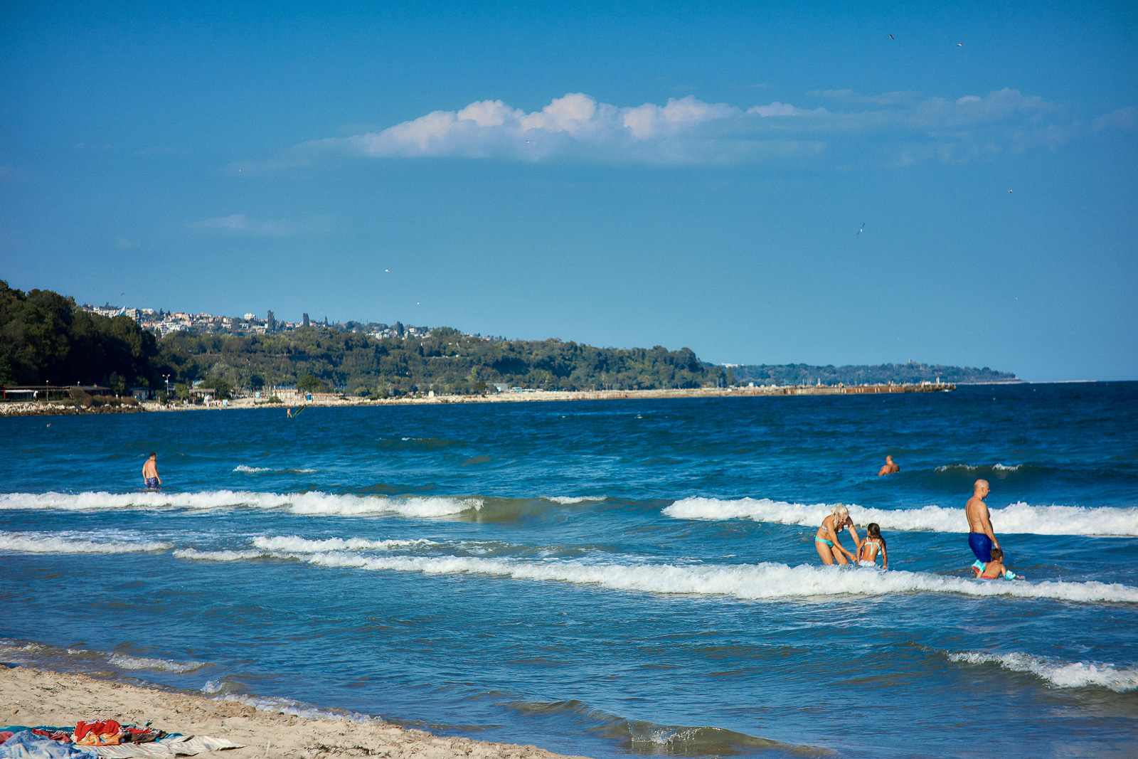 Varna south beach and people swimming in the sea