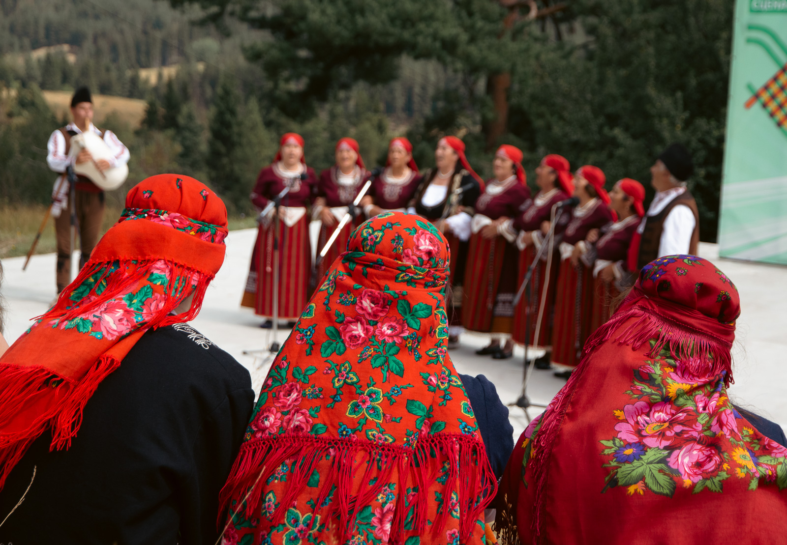 women singing in Koprivshtitsa folk fest all dressed in traditional clothing