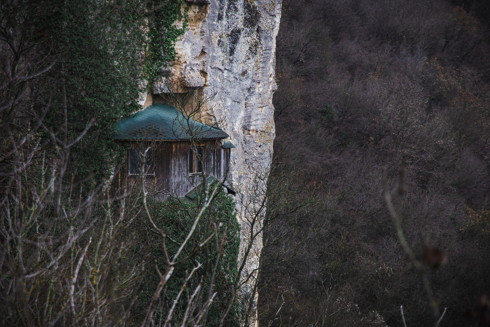 the entrance to a rock hewn church in Ivanovo inside the high cliffs