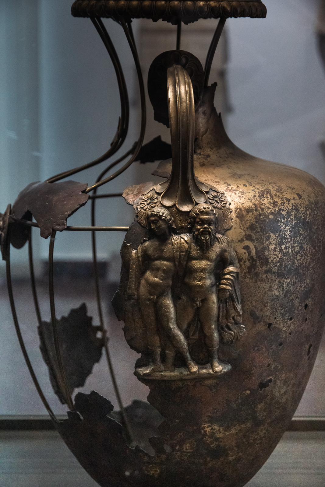 ancient bronze vase with figures in the archeology museum