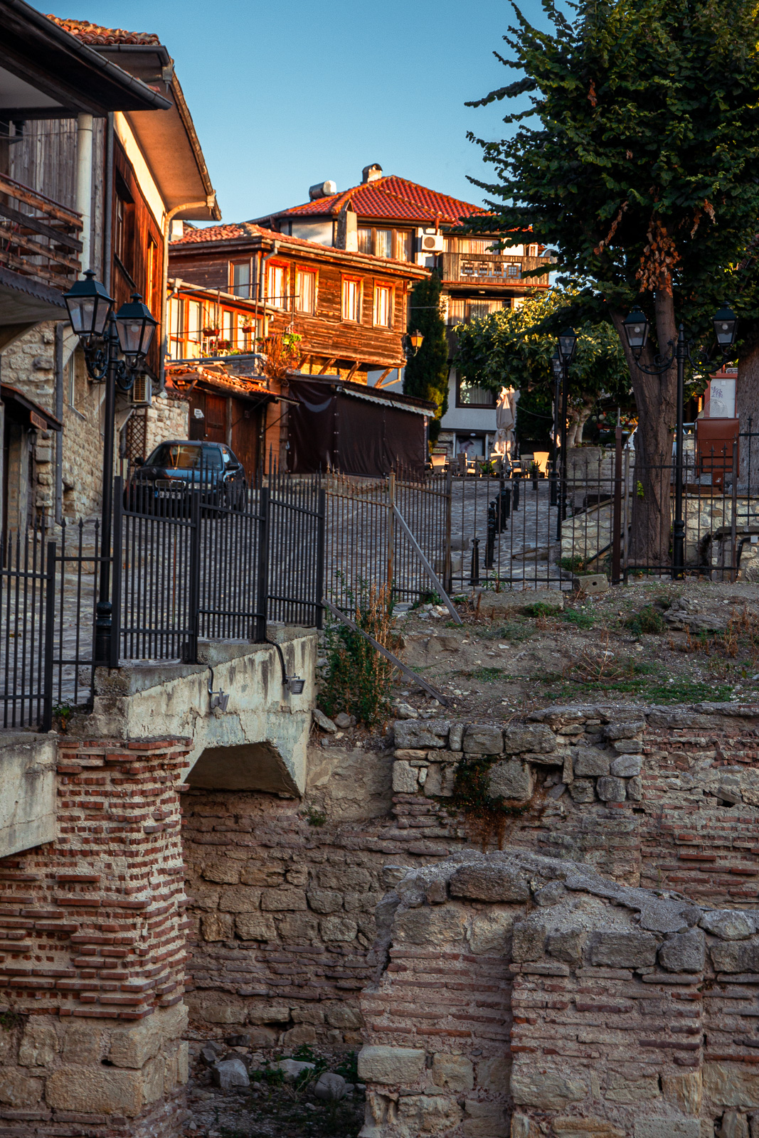 ongoing excavations of early byzantine baths in Nessebar with guest houses in the background