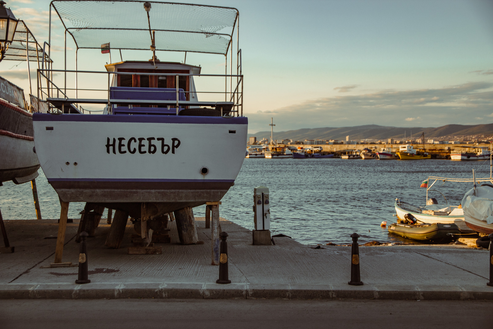A fishing boat with the sea in the background