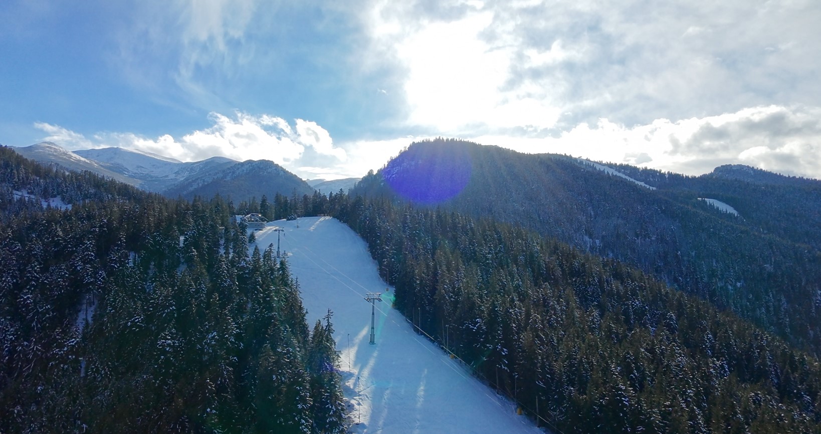 a drone panorama view of Borovets ski resort in Bulgaria during winter