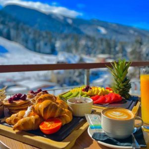 Fresh food and view towards the ski runs in one of the best hotels in Borovets, Bulgaria