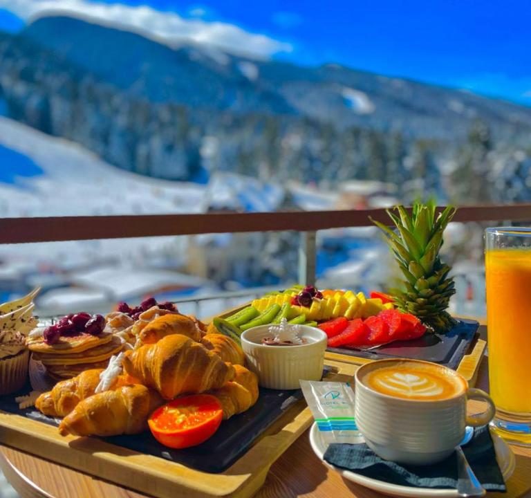 Fresh food and view towards the ski runs in one of the best hotels in Borovets, Bulgaria