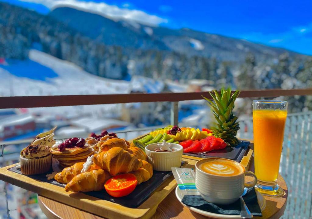 Fresh food and view towards the ski runs in one of the best hotels in Borovets, Bulgaria