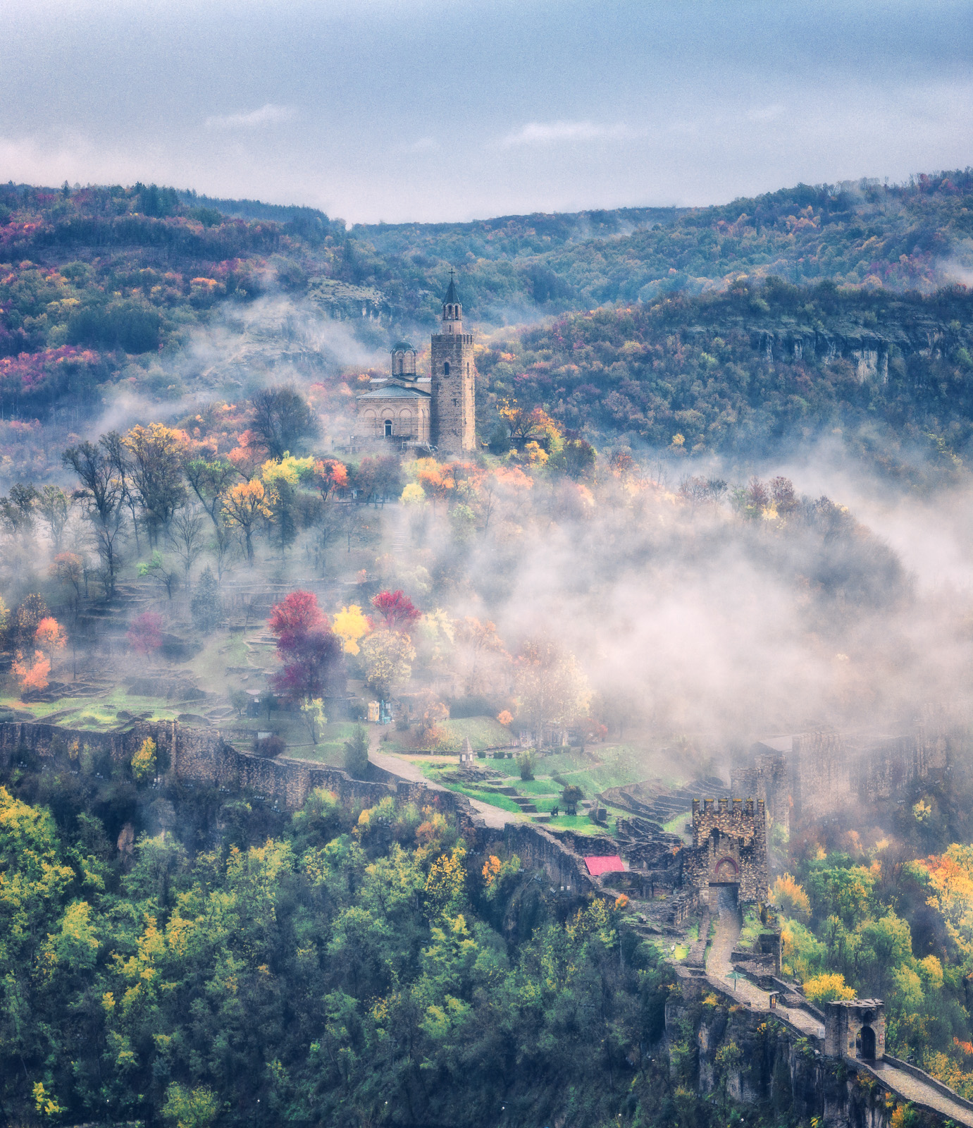 Tsarevets fortress and Tarnovgrad in misty autumn day