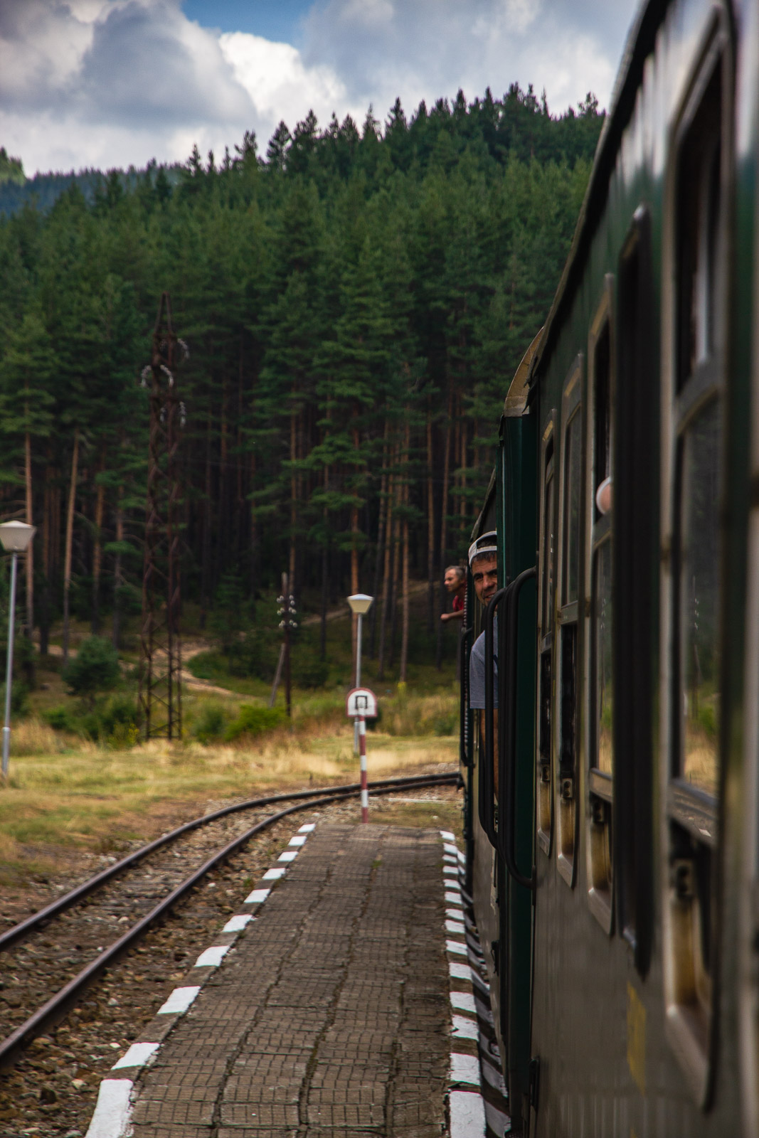 People showing from the windows of an attraction train