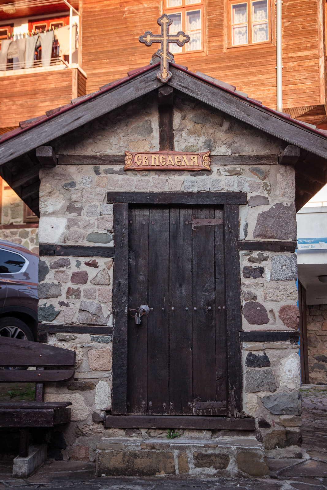 a small Christian chapel made from stones and wood