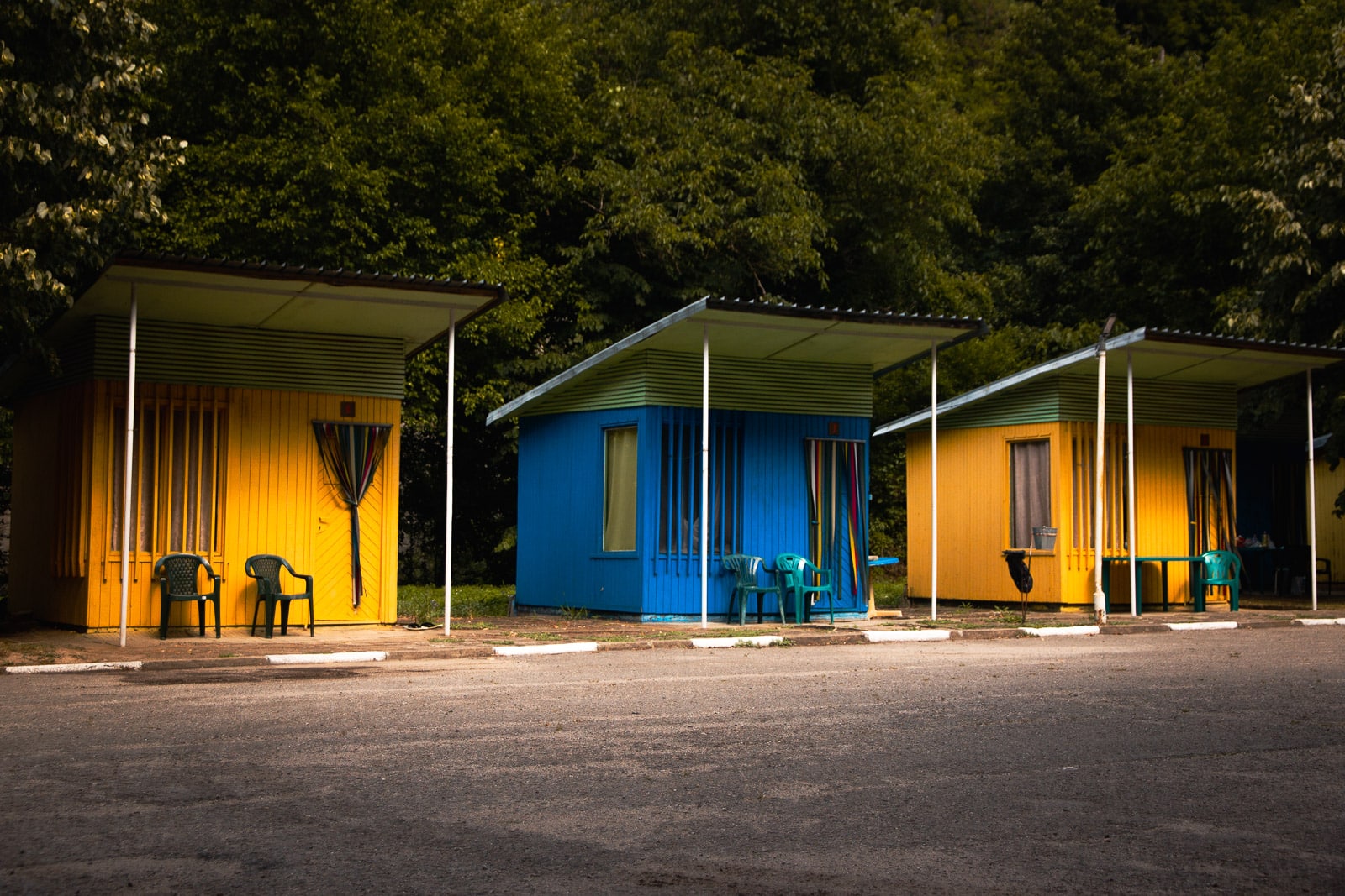 yellow and blue bungalows at Camping Strinava