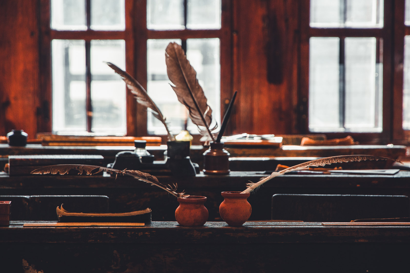 old monastery school desk with inkwells